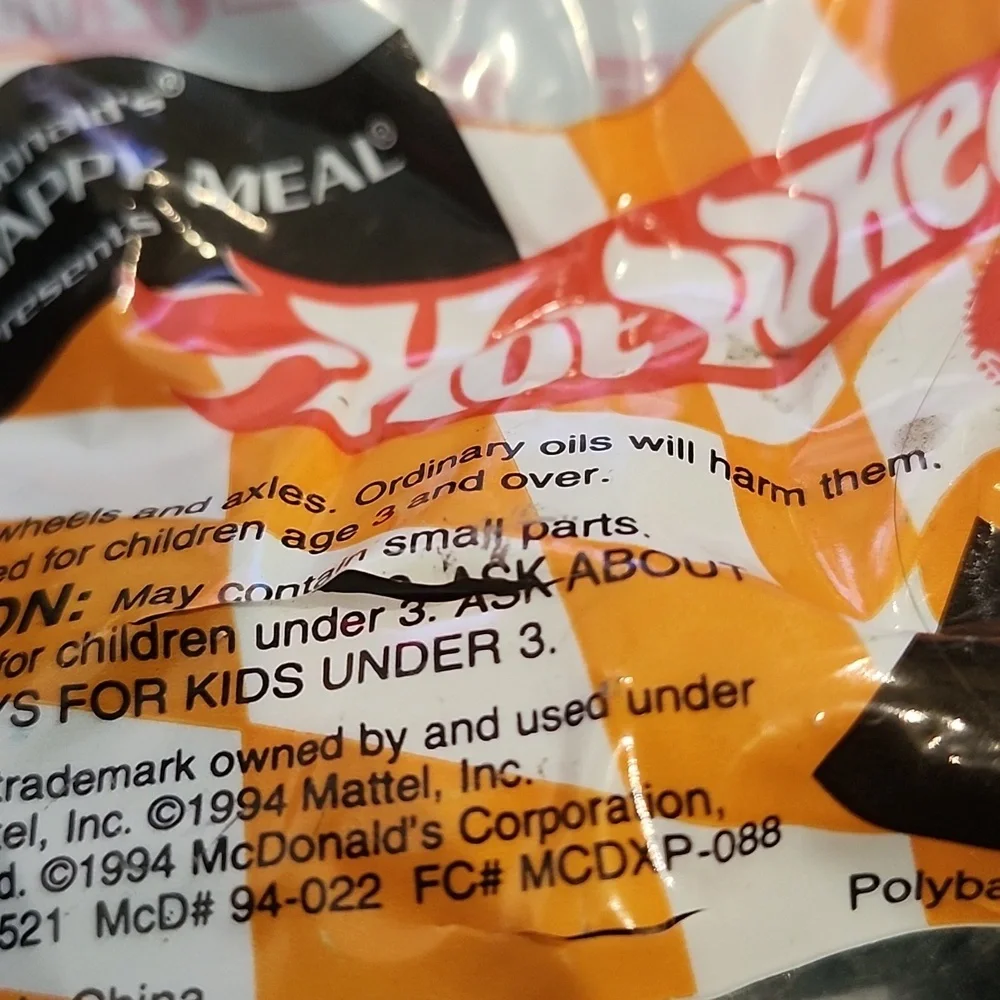 collection of three vintage 1994 McDonald's Happy Meal Hot Wheels toys